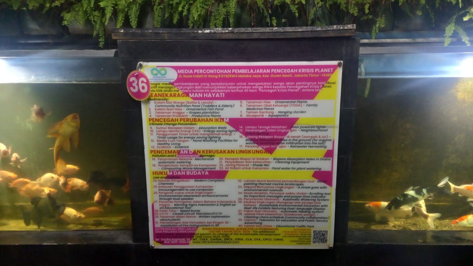 Papan edukasi lingkungan pada study visit Envis '26